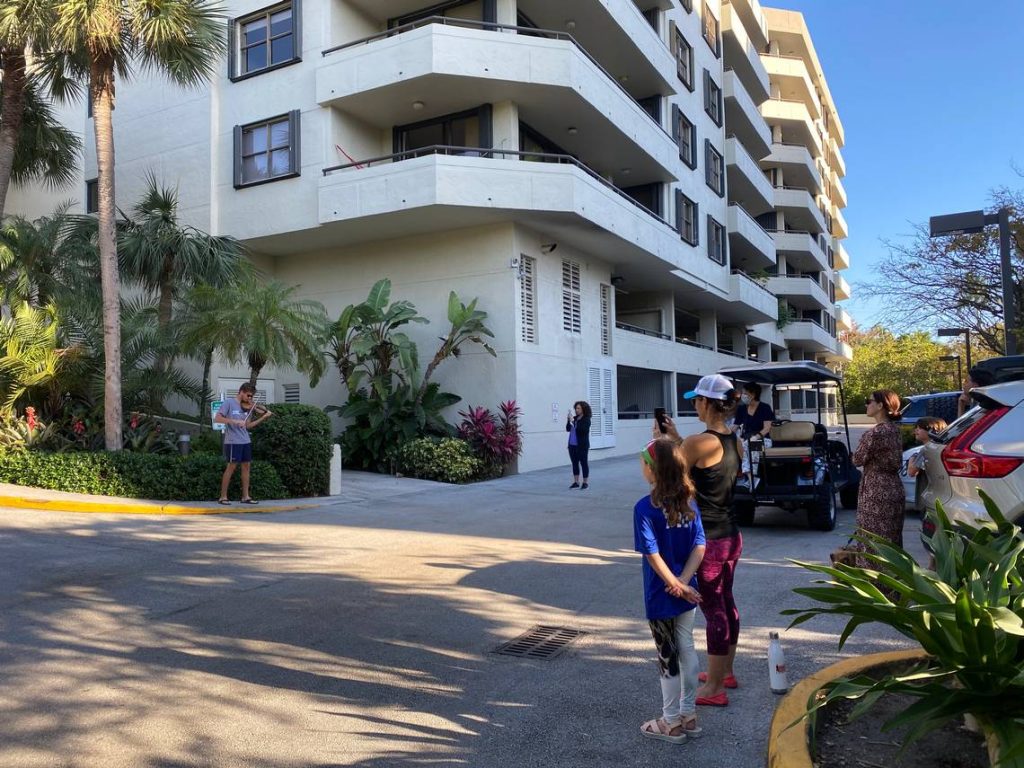 At an apartment building on Key Biscayne, Zach Buttrick, 18, plays a violin concert for the residents. Jennifer Stearns Buttrick